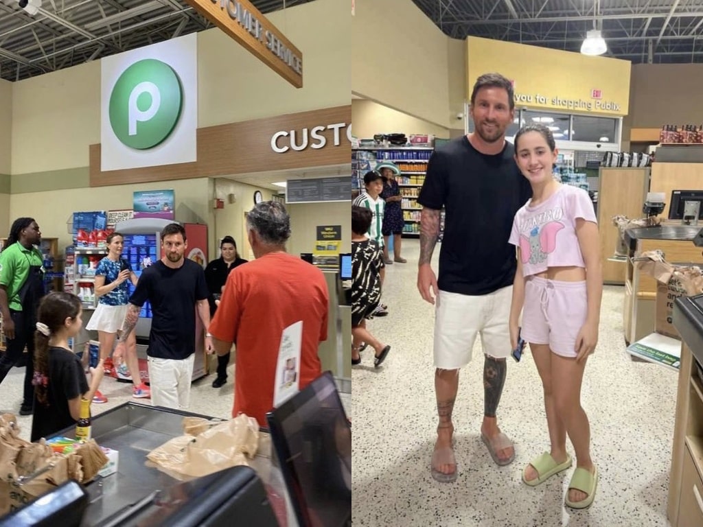 Messi takes a photo with a young fan-min