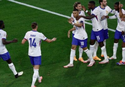 Wober-own-goal-lifts-France-to-win-amid-Mbappe-injury2-TinyPNG-800x500