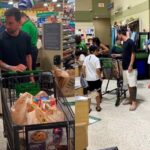 Lionel Messi goes shopping at local supermarket