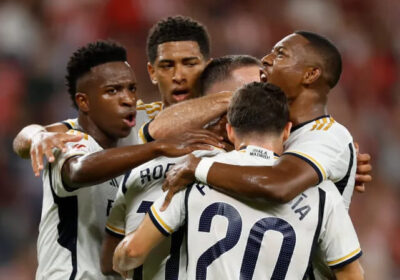 Vinicius Junior joins his Real Madrid teammates in huddle