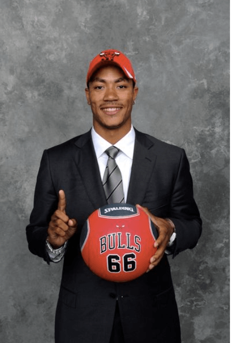 Derrick Rose, in Bulls cap, was picked No.1 overall by hometown Chicago in 2008