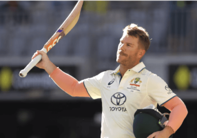 David Warner, in white uniform, acknowledges the cheers from the crowd at a recent match. Cricket Australia lifts Warner's leadership ban after 6 years