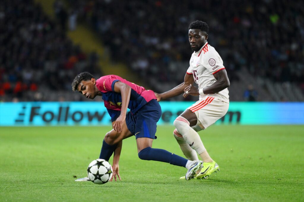 Davies who is a Barcelona target this Summer, is in action during the Champions League clash