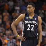 Rudy Gay, in Memphis jersey No.22) looks on at an NBA game. Gay says 'NBA days are over,' calls it quits after 17-year career