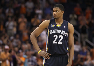 Rudy Gay, in Memphis jersey No.22) looks on at an NBA game. Gay says 'NBA days are over,' calls it quits after 17-year career