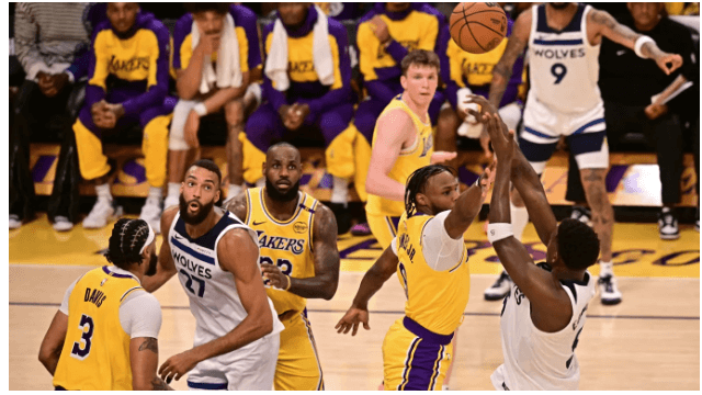 LeBron James (23, third from left), and Bronny James (9, second from right) in action together on the court in the Lakers-Timberwolves NBA opener. LeBron, Bronny play together in historic Lakers' NBA opener