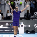 Rafael Nadal, in blue shirt and shorts, acknowledges thed cheers from the crowd in Riyadh, Saudi Arabia., Nadal says Six Kings Slam 'an opportunity to be better' despite a loss to compatriot Carlos Alcaraz.