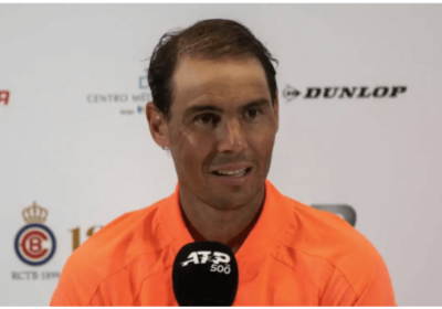 Rafael Nadal, in orange shirt, fields questions at a recent news conference. Expect Nadal to retire at the end of the 2024 season.