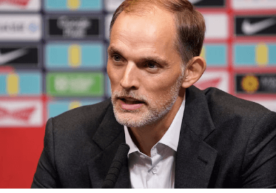 Thomas Tuchel, in blacksuit, fields questions at a recent press conference. Thomas Tuchel's appointment as England manager was met with mixed reactions.