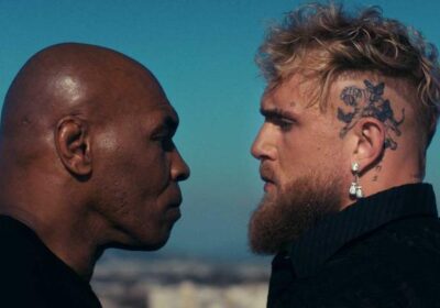 Mike Tyson, left, faces off against Jake Paul, right, at a May file photo. Tyson, Paul hype upcoming bout.