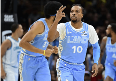 Cleveland guard Darius Garland (10) celebrates a basket in their game against the Charlotte Hornets on Sunday. Cavs top Hornets to become 4th team to start 15-0 sans Mitchell