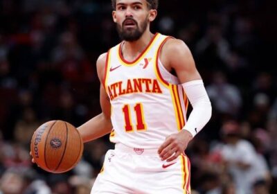 Atlanta Hawks star Trae Young (11), dribbles his way on the court in file photo. NBA fines Hawks for violating player participation policy on Young