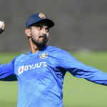 KL Rahul, in blue uniform woith cap, is ready to flick the ball back in file photo. Rahul seen as possible Sharma replacement as India skipper