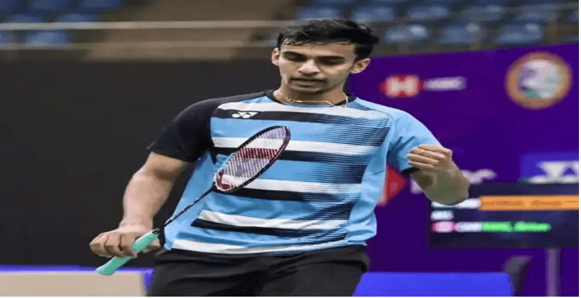 India's Kiran George, in blue striped shirt, prepares for a return shot in his match at Iksan City, South Korea, on Wednesday. George, Aaron-Wooi Yik beat foes to reach Korea Masters quarters