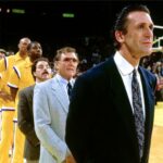 Pat Riley, right, in black suit, watches the action from the bench when he was coach of the LA Lakers in th 1980s. Lakers to honor Pat Riley with statue outside arena