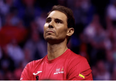 Rafael Nadal, in red, turns emotional after his last match at the Davis Cup on Monday. Nadal, Federer eyed as future Laver Cup captains for Europe