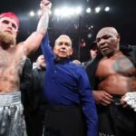 Jake Paul (left) had his hands raised in victory after beating Mike Tyson (right) in their fight on Saturday. Paul, Tyson suspended after Texas fight to comply with TDLR rules