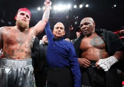 Jake Paul (left) had his hands raised in victory after beating Mike Tyson (right) in their fight on Saturday. Paul, Tyson suspended after Texas fight to comply with TDLR rules