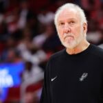 Coach Gregg Popovich ponders a moment at the sideline in a recent NBA game. Popovich recovering from mild stroke, says Spurs