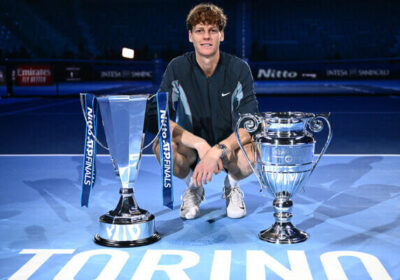 World No.1 Jannik Sinner poses with his two trophies after the final against Taylor Fritz of the US on Sunday. Sinner raises ATP Finals trophy after dropping Fritz in final