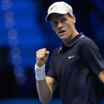 Jannik Sinner pumps his fist and grins in his match against Taylor Fritz in Turin, Italy, on Tuesday. Sinner perfect in ATP Finals before home crowd