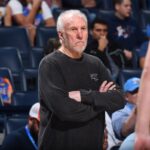 San Antonio coach Gregg Popovich, in black shirt, looks on from the sidelines at a recent game.Spurs 'to play hard and compete' for Popovich amid coach's illness