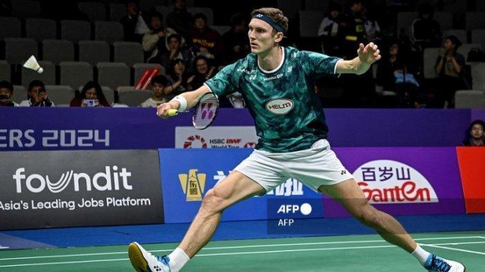 Denmark's Viktor Axelsen (in green shirt) in action in file photo. Axelsen pulls out of World Tour Finals 2024 due to foot injury