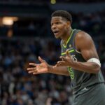 Minnesota guard Anthony Edwards (5) raises his arms after a call was slapped gainst him in the Wolves loss to the Warriors. Edwards slaps 'terrible' refs after Wolves' loss to Warriors