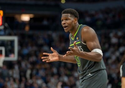 Minnesota guard Anthony Edwards (5) raises his arms after a call was slapped gainst him in the Wolves loss to the Warriors. Edwards slaps 'terrible' refs after Wolves' loss to Warriors