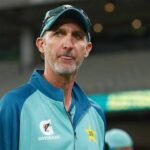 Coach Jasson Gillespite, in blue uniform, bites his tongue during a match in file photo. Gillespie resigns as Pakistan coach after Nielsen deal not renewed