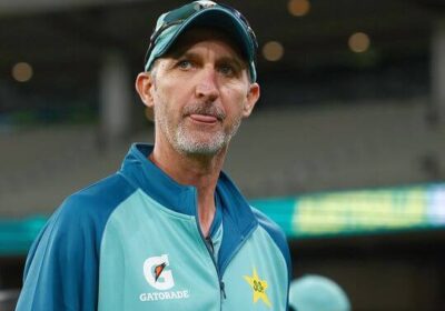 Coach Jasson Gillespite, in blue uniform, bites his tongue during a match in file photo. Gillespie resigns as Pakistan coach after Nielsen deal not renewed