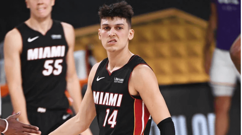 Miami guard Tyler Herro (14) smirks during a break in their match against the Los Angeles Lakers on Wednesday. Herro drops 9 treys as Heat torch Lakers