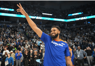 Karl Anthony Towns (in blue shirt) achknowledges the cheers from the crowd at Target Center on Thursday. Towns gets warm welcome, standing ovation in Minnesota return