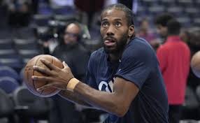 Los Angeles Clippers forward Kawhi Leonard, in lack shirt, drives to the basket, in practice in Los Angeles on Tuesday. Leonard seen in practice for Clippers