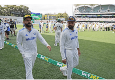 India's Virat Kohli (left) and Rohit Sharma (right) walk together in a recent match in file photo. Kohli, Sharma fall in ICC batter rankings