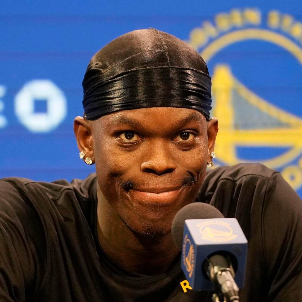 German pointguard Dennis Schroder, middle fields questions in his news conference in San Francisco on Tuesday. Schroder to wear No.71 jersey, 'excited' to play with Curry, Green