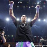 Ukraine's Oleksandr Usyk raises his hands in jibliation after his latest fight against Tyson Fury on Saturday. Usyk seeks Dubois-Parker winner for undisputed heavyweight title