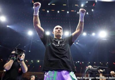 Ukraine's Oleksandr Usyk raises his hands in jibliation after his latest fight against Tyson Fury on Saturday. Usyk seeks Dubois-Parker winner for undisputed heavyweight title