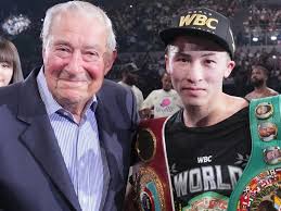 Top Rank promoter Bob Arum (left) poses with Japanese undisputed super bantamweight champion Naoya Inoue (right) in file photo. Arum claims Inoue's career 'more legendary' than Pacquiao