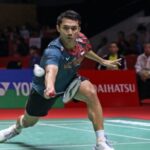 Indonesia's Jonatan Christie lunges for a shot against Chinese Taipei's Lin Chun-yi on Thursday. Christie outworks Lin, reaches Indonesia Open last 8