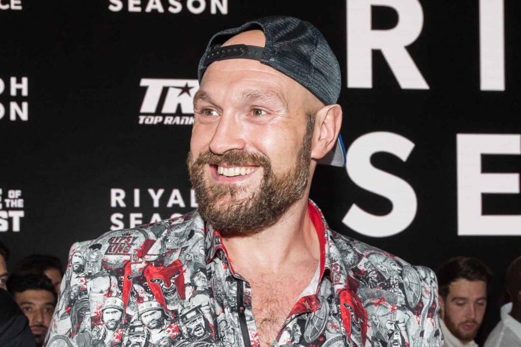 British fighter Tyson Fury was all smiles at a news conference in file photo. Fury retires again after rematch loss to Usyk