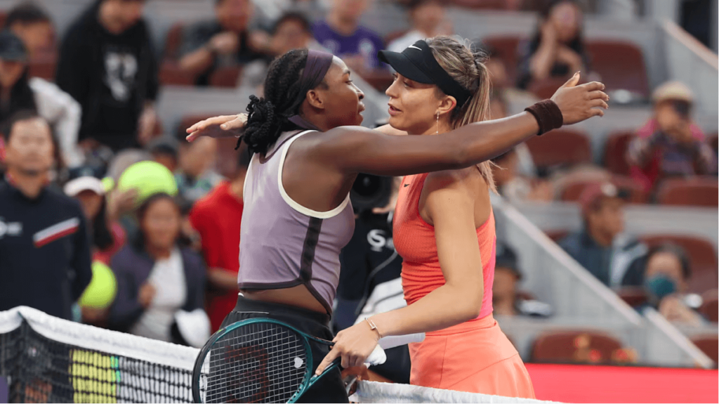 American Coco Gauff (left), and Spain's Paula Badosa (right) embrace at center court after their match on Tuesday. Gauff falls to Badosa