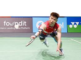 Malaysia's Leong Jun Hao responds to a shot against China's Li Sheng Feng on Tuesday. Jun Hao upsets Li in Indian Open