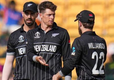 New Zealand captain Mitchell Santner (middle) talks to his teammates during a moment at a match in file photo. NZ's ICC Champions Trophy roster has 'raw pace,' says Santner