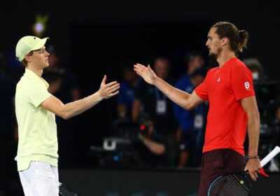 Italy's Jannik Sinner (left) and Germany's Alexander Zverev (ar about to shake hands in center court after their men's singles final on Sunday. Sinner advises Zverev to 'keep believing in yourself' after finals win