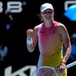 Poland's Iga Swiatek pumps her fist during her match against Emma Navarro in Melbourne on Wednesday. Swiatek routs Navarro, advances to Australian Open semis vs Keys