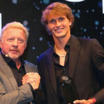 German tennis legend Boris Becker (left) and world No.,2 Alexander Zverev (right) share the spotlight at a recent event in file photo. Zverev should win Grand Slam 'in the next 18 months,' says Becker