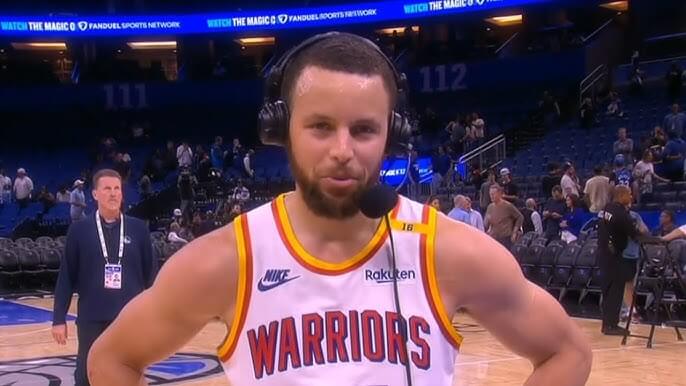 Golden State guard Stephen Curry fields questions on a courtside interview with b roadcasters on Thursday. Stephen Curry drops 56 points and 12 three-pointers on Thursday after the Golden State Warriors' road win over the Orlando Magic.