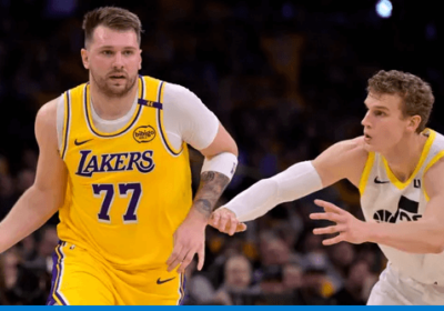 New Los Angeles Lakers guard Luka Doncic (left) dribbles over Utah center Walker Kessler (right) in their teams' match on Monday. Lakers welcome Doncic with win over Jazz; 'Luka Magic' shines