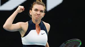 Romania's Simona Halep pumps her first at a tennis match in file photo. Halep ponders retirement due to 'serious' knee injury